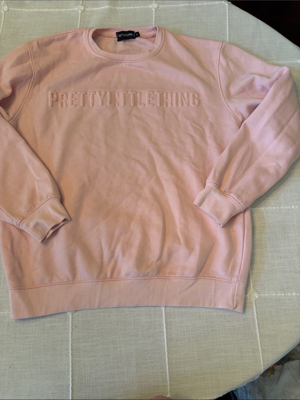PrettyLittleThing Pastel Pink Embossed Logo Sweatshirt